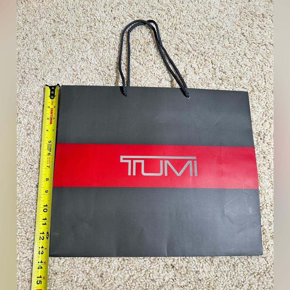 Tumi empty gift bag